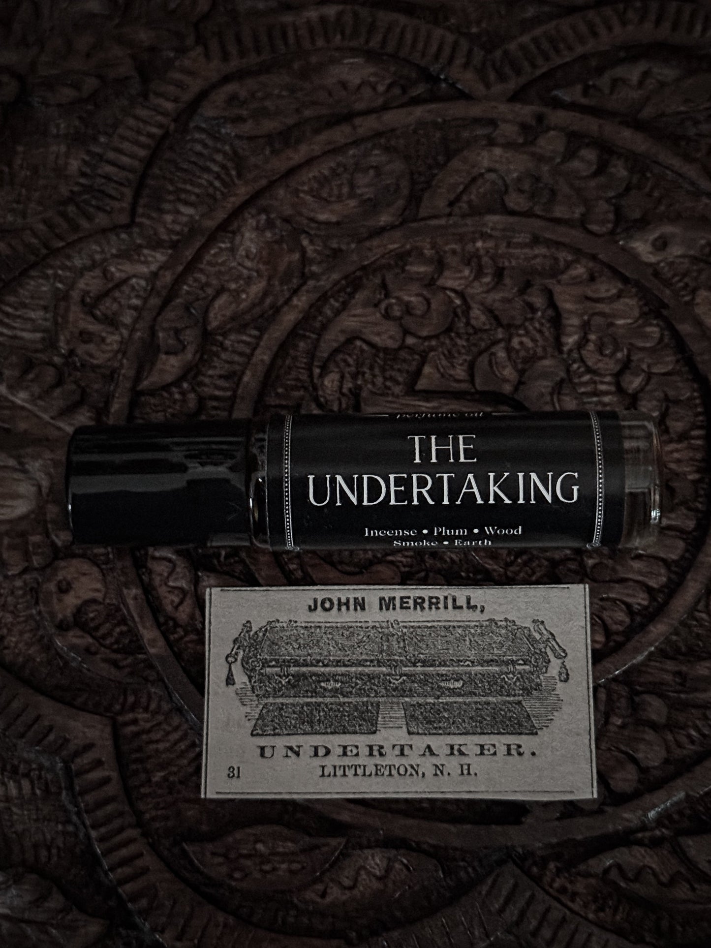 The Undertaking (plum & smoky wood)