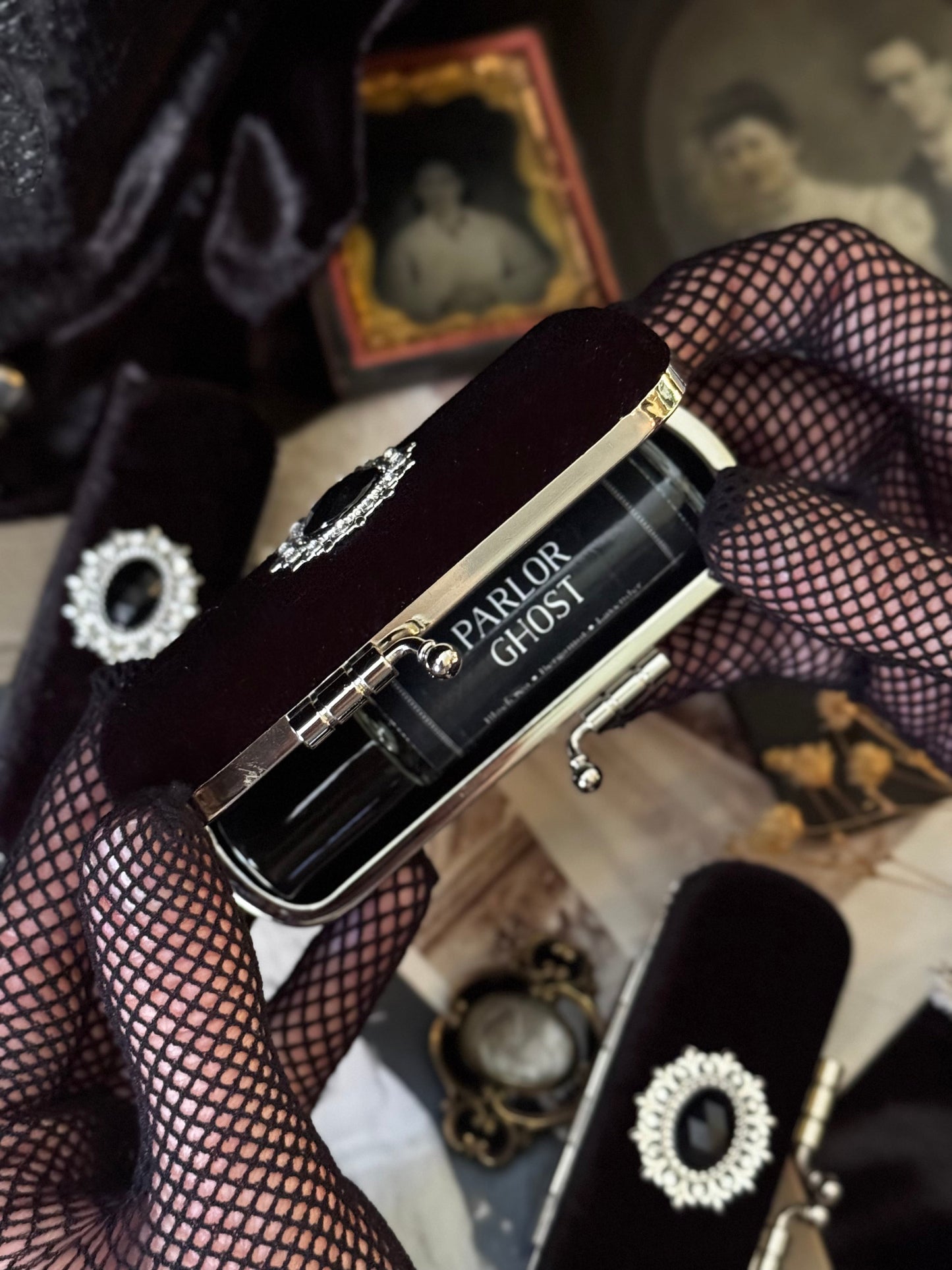 The Mourning Compact - perfume carry case.