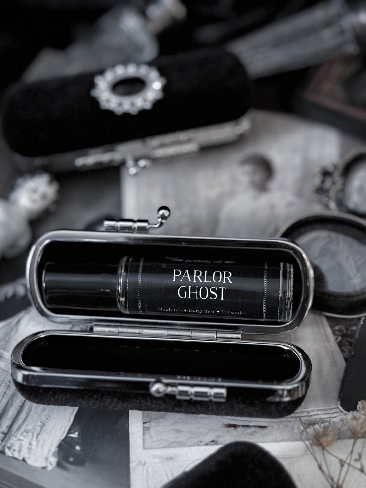 The Mourning Compact - perfume carry case.