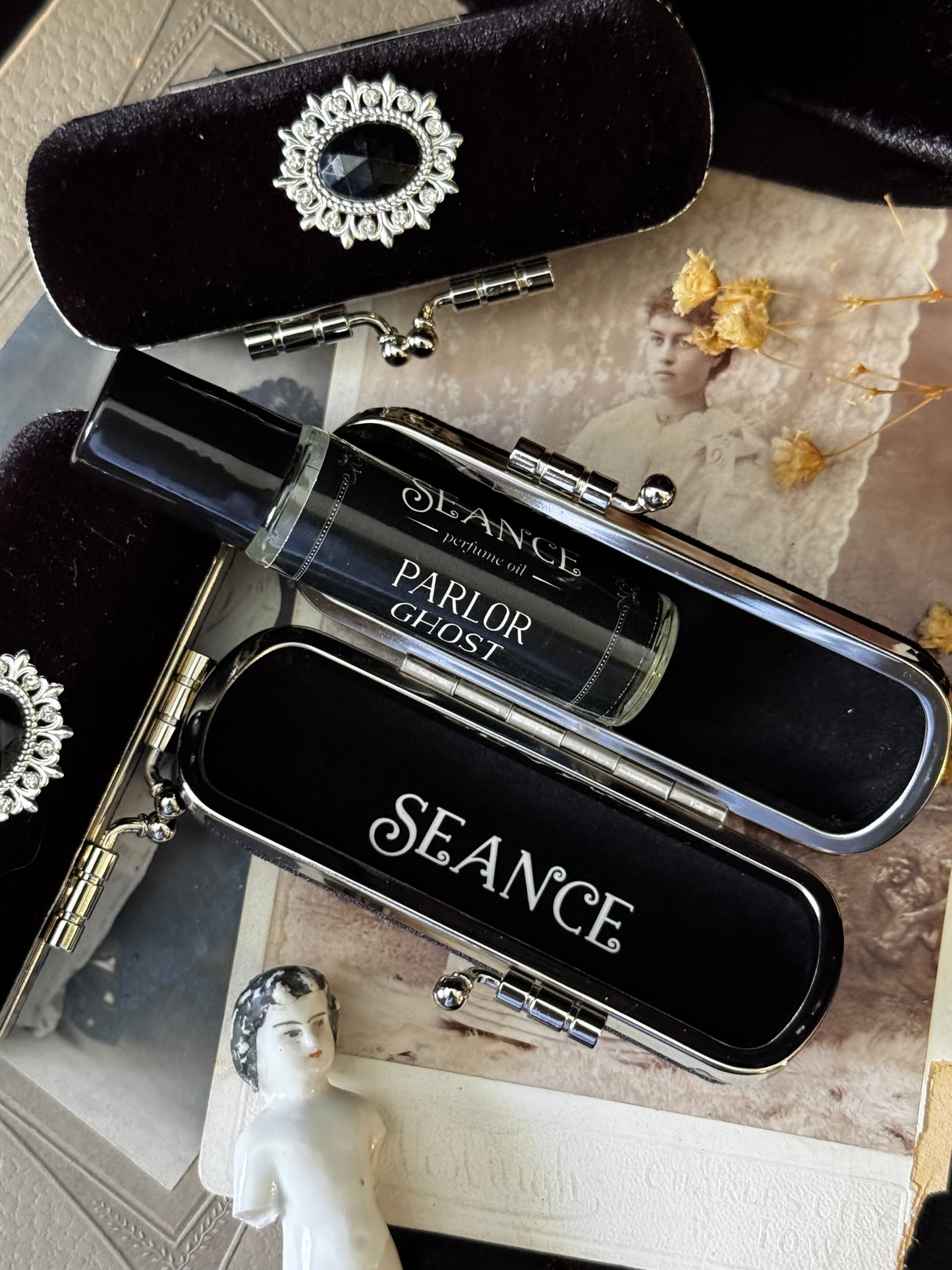 The Mourning Compact - perfume carry case.