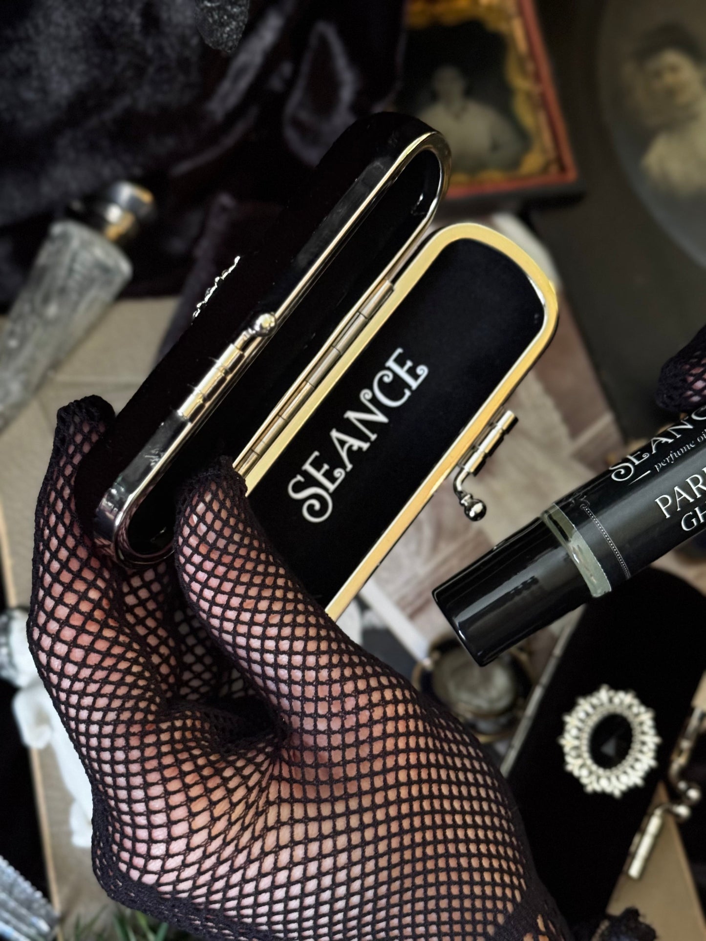 The Mourning Compact - perfume carry case.