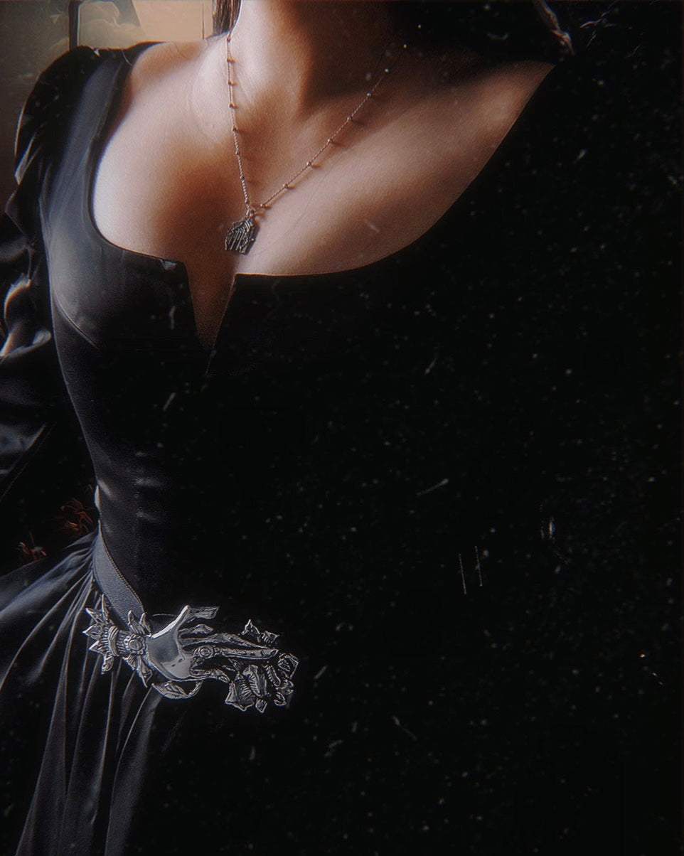 The "Lucerna: Mourning Hand” Belt Buckle