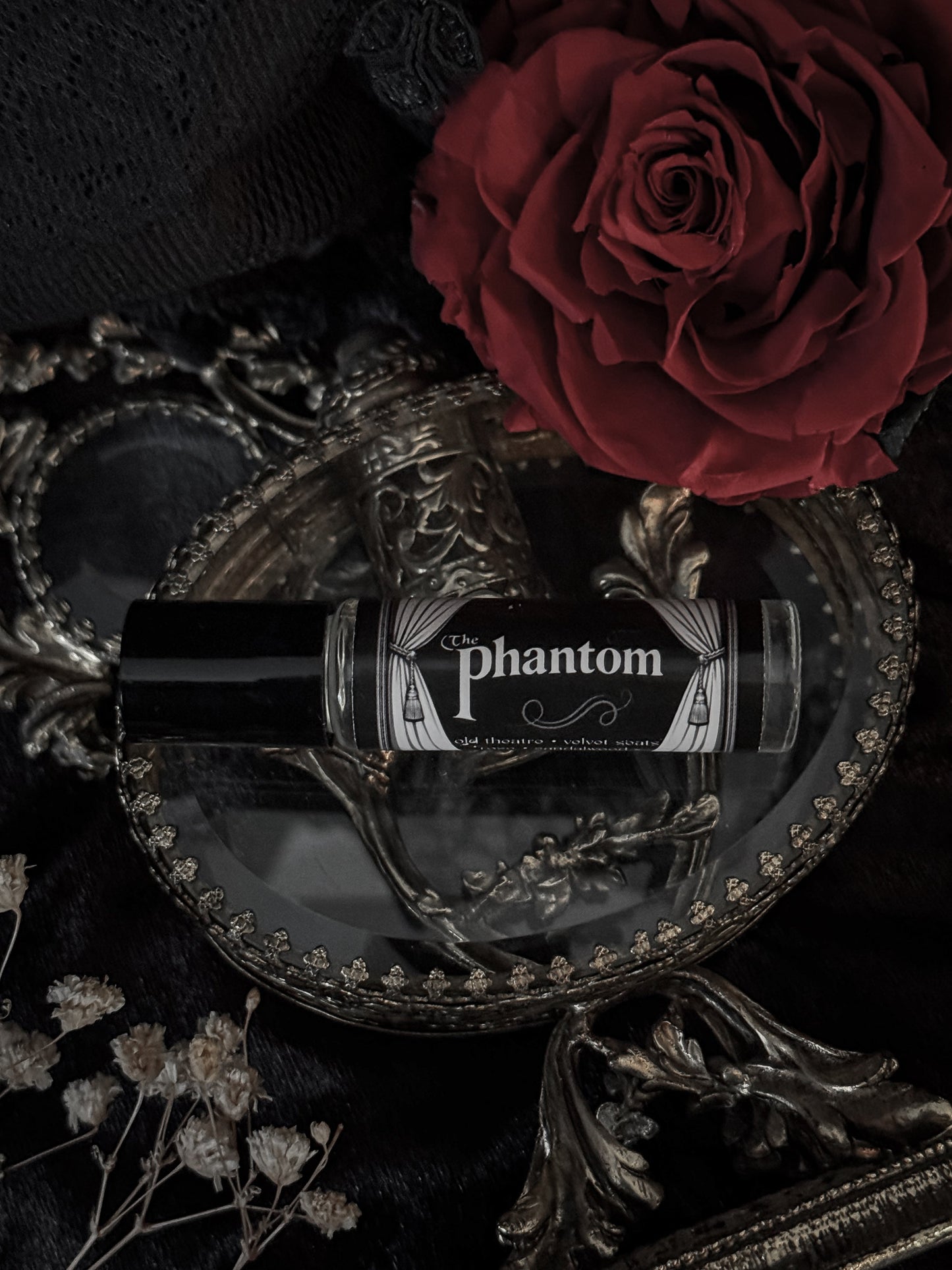 The Phantom- (rose, sandalwood, bourbon, velvet seats)