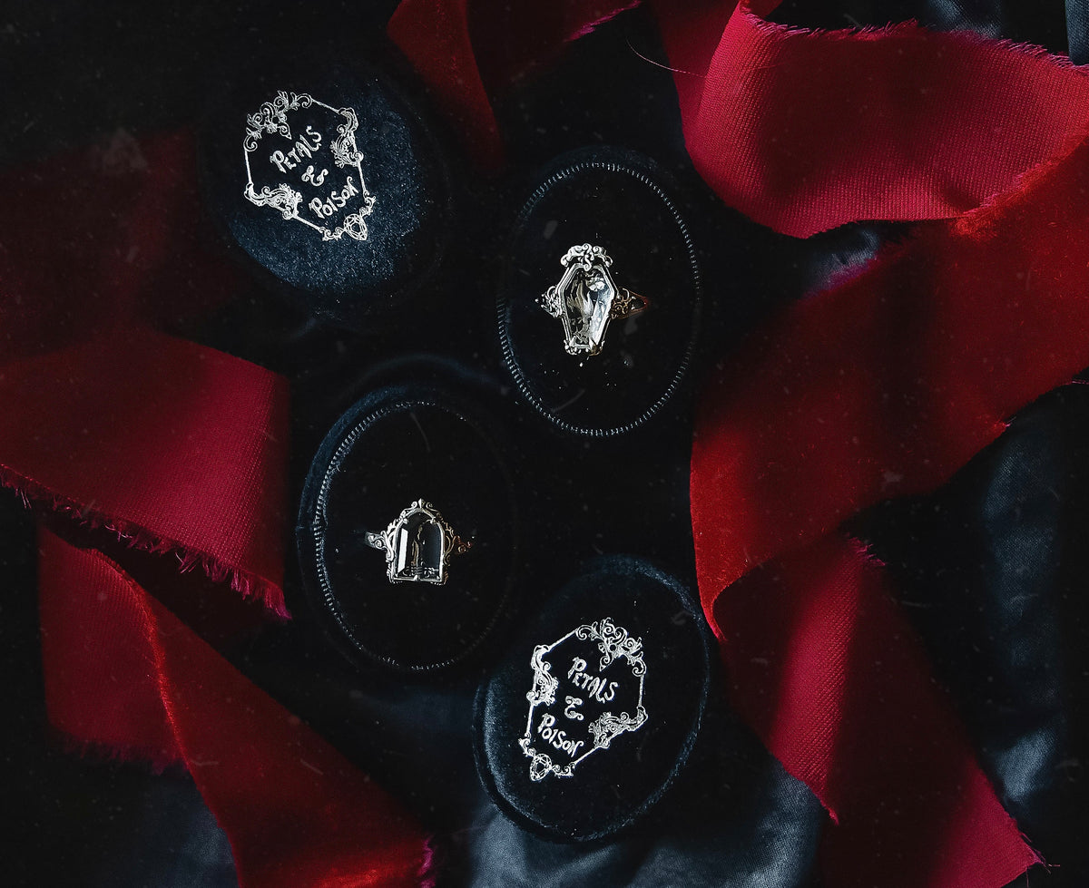 The "Mourning Hand" Glass Casket Ring