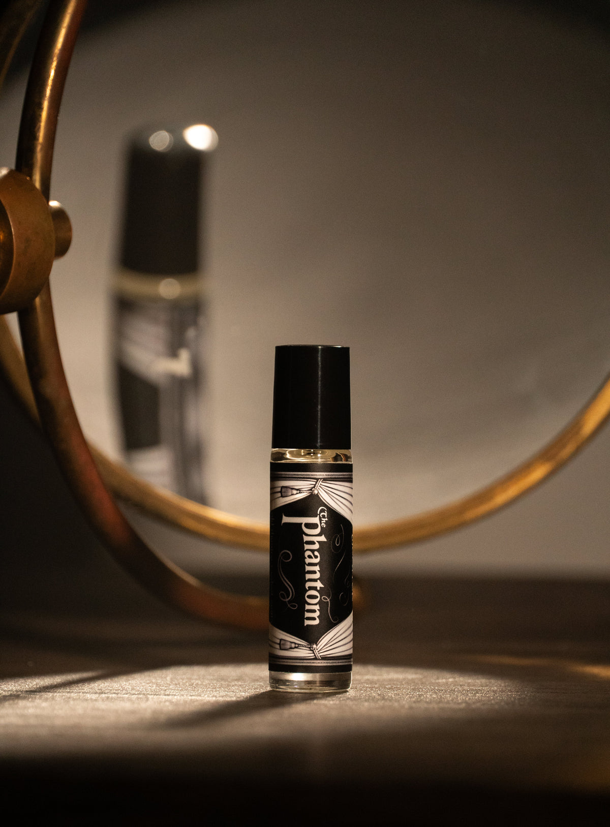 The Phantom (rose, sandalwood, bourbon, velvet seats)