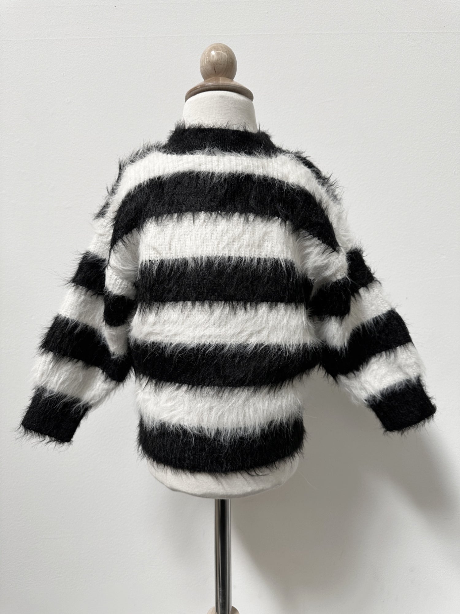 Black and white fuzzy sweater sale